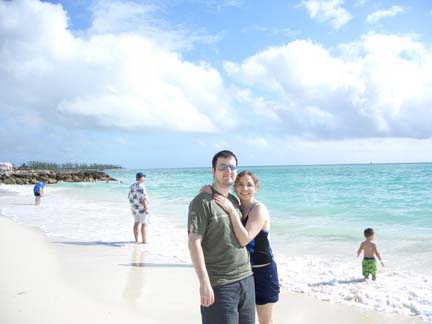 Us on beach in Bahamas sunny